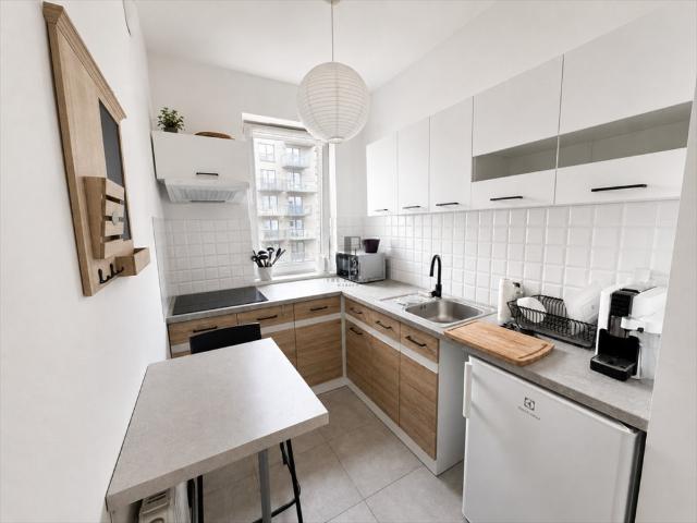 Nowoczesne 35 m² z dużym balkonem, garażem i patio