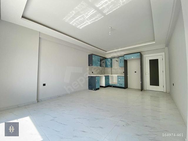 Milas Aydınlıkevler'de Satılık 2+1 Daire Harmaya Real Estate