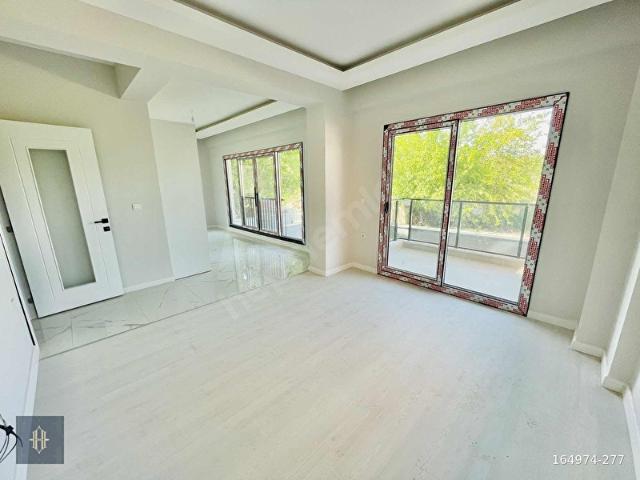 Milas Aydınlıkevler'de Satılık 2+1 Daire Harmaya Real Estate