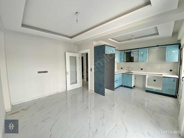 Milas Aydınlıkevler'de Satılık 3+1 Daire Harmaya Real Estate
