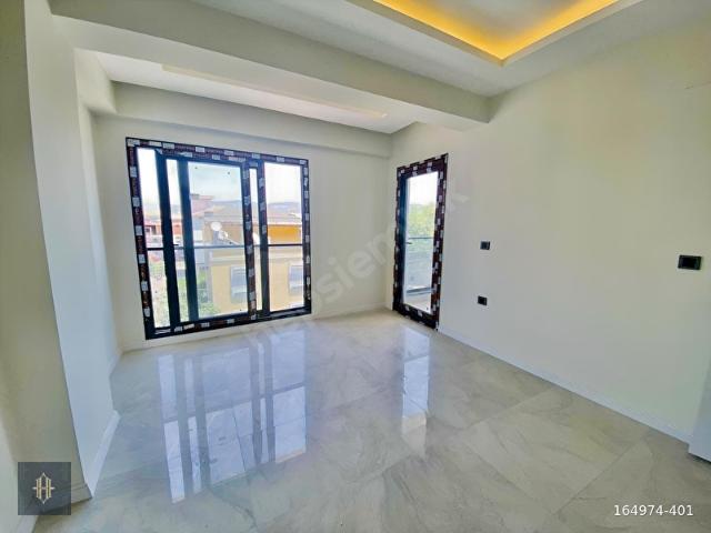 Milas Burgaz Mahallesinde Satılık 2+1 Daire Harmaya Real Estate