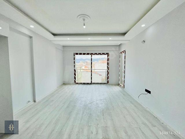 Milas Burgaz'da Satılık 3+1 Daire Harmaya Real Estate