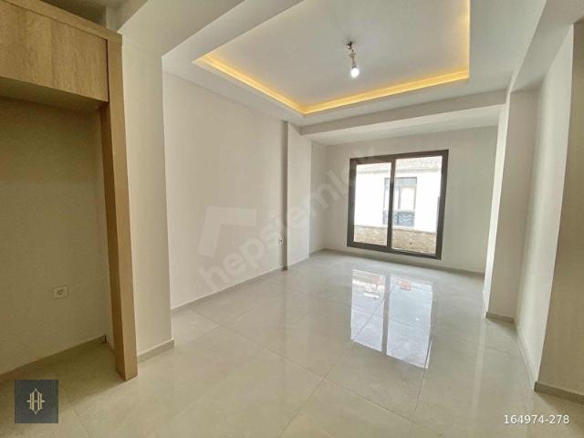 Milas Güneş Mahallesinde Satılık 2+1 Daire Harmaya Real Estate