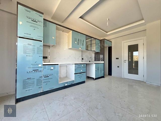 Milas'ta Satılık 2+1 Kapalı Mutfak Daire Harmaya Real Estate