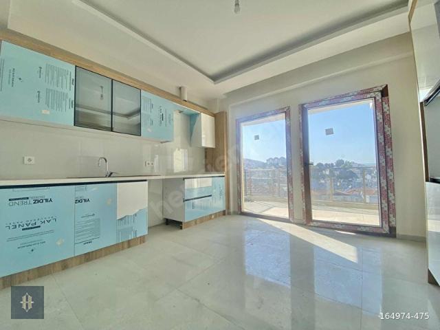 Milas'ta Satılık 4+1 135 m2 Dubleks Daire Harmaya Real Estate