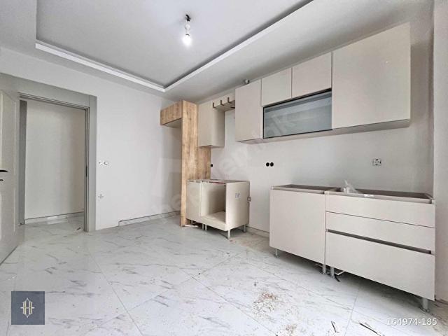 Milas'ta 130 m2 Satılık 3+1 Daire Harmaya Real Estate