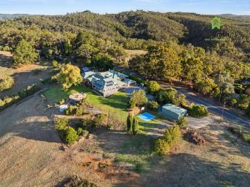 The Ultimate Multi Generational Estate: Two Residences, Infinite Views, Absolute Privacy & Income Potential