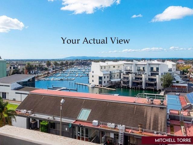 Amazing views, 2 car spots & storage room