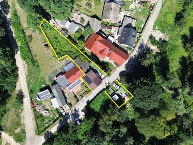 Przestronny dom z ogrodem, garażem i budynkiem gospodarczym