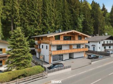 Exklusives Penthouse – Erstbezug mit direktem Liftzugang, offenem Wohnkonzept, Glaskamin & traumhaftem Bergblick in sonniger Top Lage