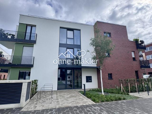 Möbelierte Neubau 2 Zimmer Wohnung mit sonniger Terrasse und Garten