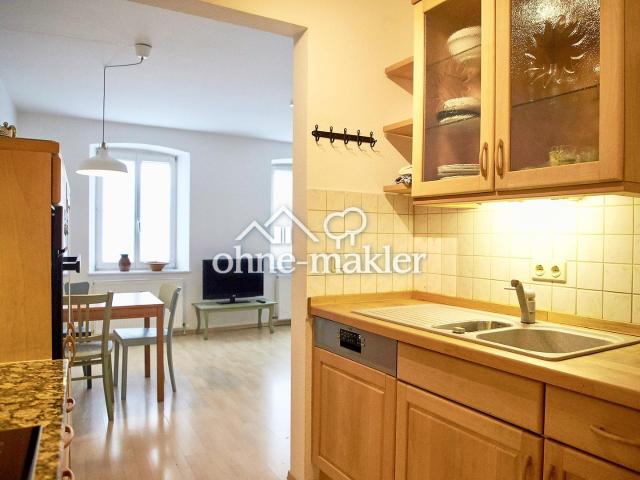 Möblierte 2 Zimmer Wohnung mit Einbauküche & Carport in zentraler Lage