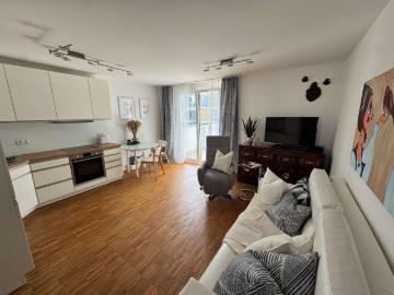 Möblierter Neubau mit Balkon