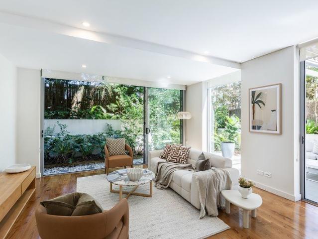 MODERN 3 BED GARDEN APARTMENT WITH A SECURE CAR SPACE IN THE HEART OF BONDI JUNCTION