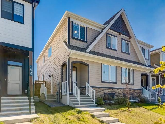 Modern 3 Bed + Office Half Duplex in Mahogany — 3 Bedrooms+ Den Main Floor
