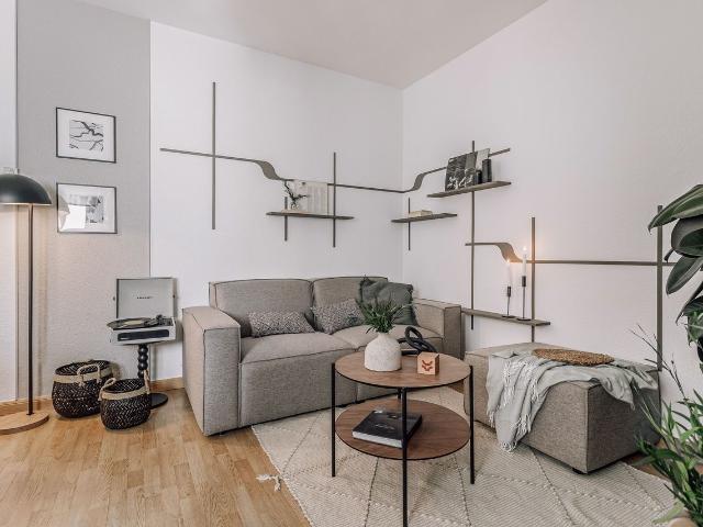 Modern 3 Bedroom Apartment with Office and High End Amenities on Fernán González Street, Madrid Amsterdam Apartments for Rent