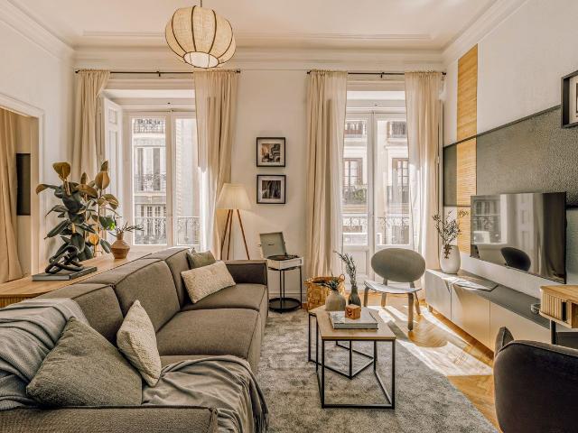 Modern 3 Bedroom Apartment with Designer Finishes on Hortaleza Street, Madrid Amsterdam Apartments for Rent