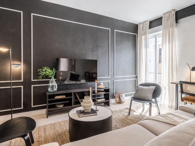 Modern 3 Bedroom Apartment with Terrace and Designer Furnishings in María de Guzmán, Madrid Amsterdam Apartments for Rent