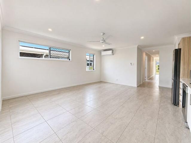 Modern 3 Bedroom Duplex with Spacious Fully Fenced Backyard