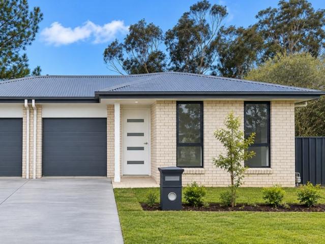Modern 3 bedroom home in Watagan Park Ducted Air Con, Ensuite, Alfresco, 2 Living Areas