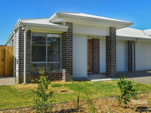 Modern 3 Bedroom Unit with Air Conditioning & Low Maintenance Living