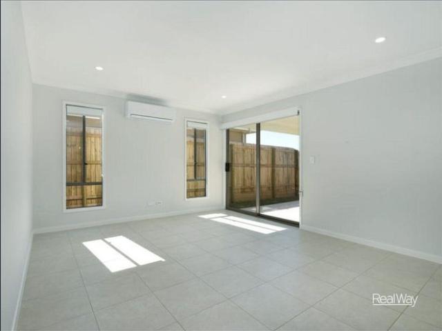 Modern 3 Bedroom Unit with Air Conditioning & Low Maintenance Living