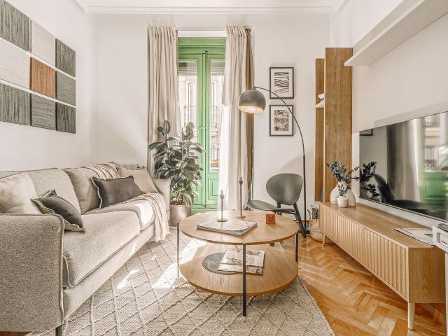 Modern 1 Bedroom Apartment with Designer Furniture and High Speed WiFi on Barquillo Street, Madrid Amsterdam Apartments for Rent