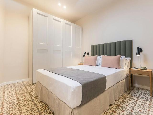 Modern 1 Bedroom Apartment with Rooftop Terrace in Eixample, Barcelona Amsterdam Apartments for Rent