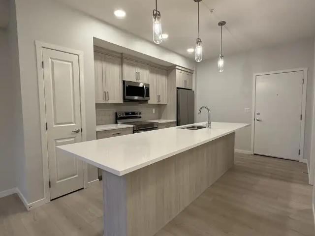 Modern 1 Bedroom Condo with A/C & Parking in Seton – $1,600/Month