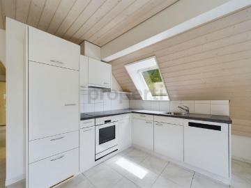 Modern 2.5 room attic apartment with balcony, Grindel