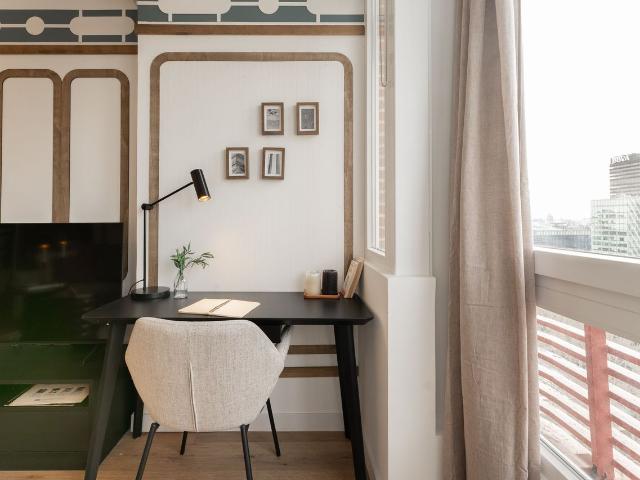 Modern 2 Bedroom Apartment with Designer Decor and Smart Amenities in Orense Street, Madrid Amsterdam Apartments for Rent