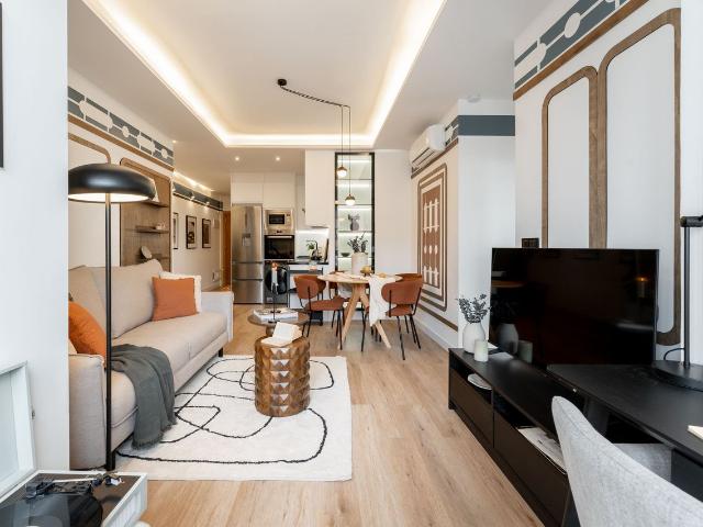 Modern 2 Bedroom Apartment with Designer Decor and Smart Amenities in Orense Street, Madrid Amsterdam Apartments for Rent