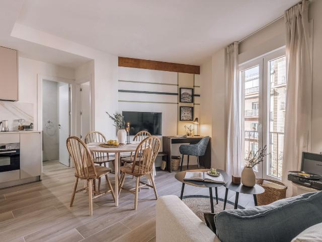 Modern 2 Bedroom Apartment with Designer Furniture and Ducted Air Conditioning in Bailén Street, Madrid Amsterdam Apartments for Rent