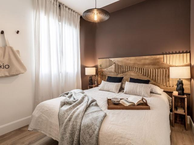 Modern 2 Bedroom Apartment with Spacious Terrace and Mountain Inspired Design in Chueca, Madrid Amsterdam Apartments for Rent