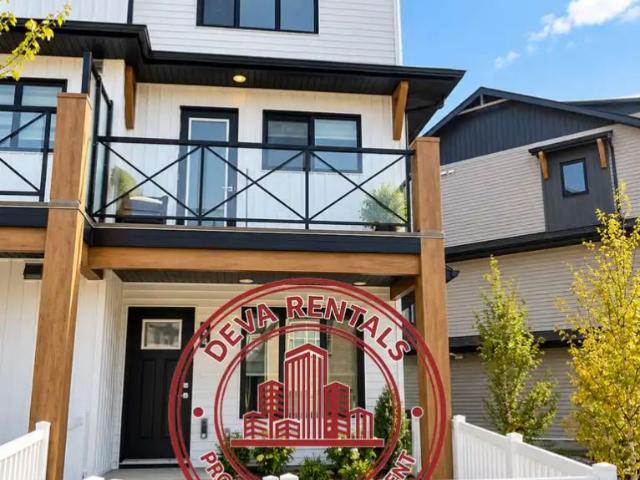 Modern 2 Bedroom + Den Townhouse in Secord | Single Garage | One Month Free Rent — Modern 2 Bedroom + Den Townhouse in Secord | Single Garage | One Month Free Rent