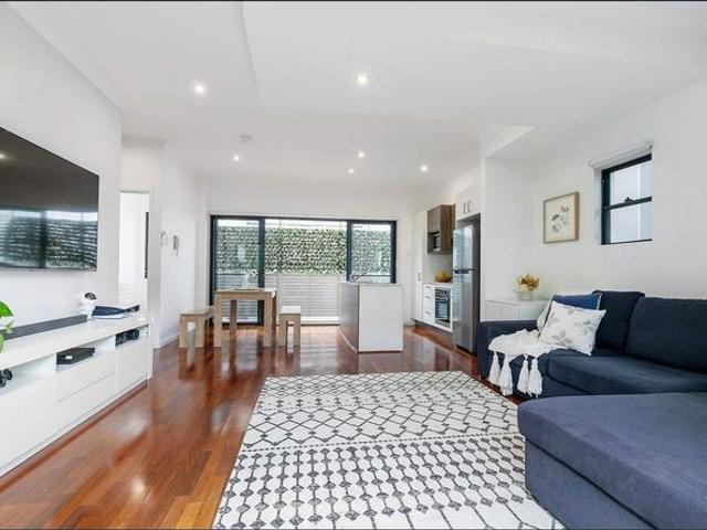 Modern 2 Bedroom Townhouse with Entertaining Appeal