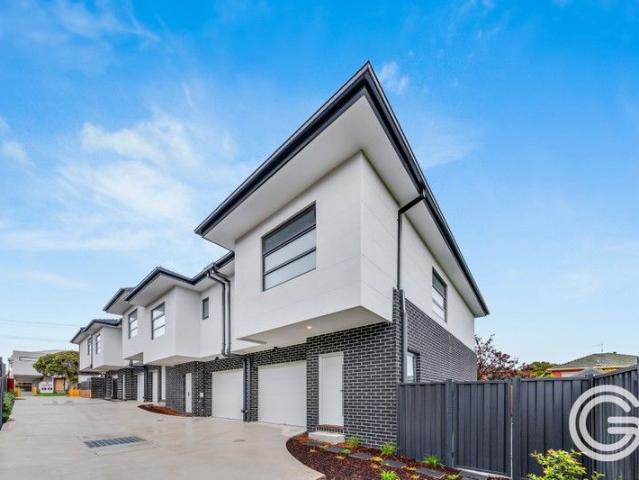 Modern 2 Bedroom Townhouse with Space to Grow!