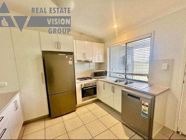 Modern 2 Bedroom Unit Partially Furnished Available Now