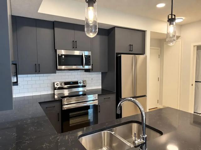 Modern 2 Bedroom + 2 Bathroom – Underground Parking + Large Locker CALGARY NW — 2 Bedrooms Condo Unit