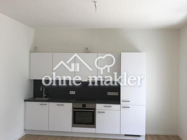 Modern 2‑room apartment with balcony in Wasserstadt Mitte – 1st floor