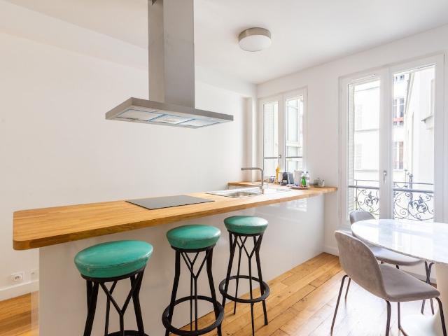 Modern 2BR Apartment near the Eiffel Tower with AC and Workspace