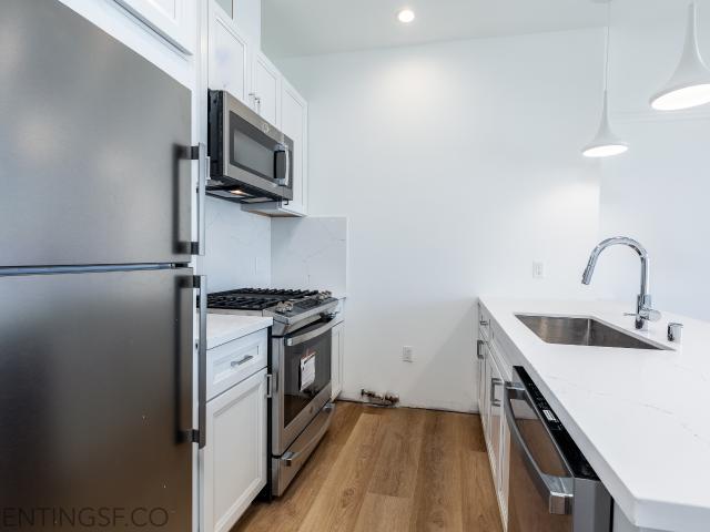 Modern 2BR WFH with Parking included! Shared Roof Deck with Views!