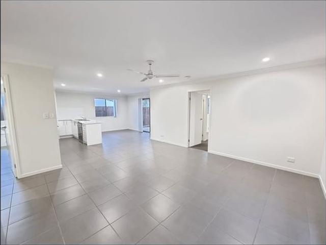 MODERN 4 BEDROOM FAMILY HOME WITH OPEN PLAN KITCHEN LIVING DINING THAT OPENS OUT ONTO AN ALFRESCO DINING AREA. EASY TO MAINTAIN YARD. CLOSE TO SCHOOLS