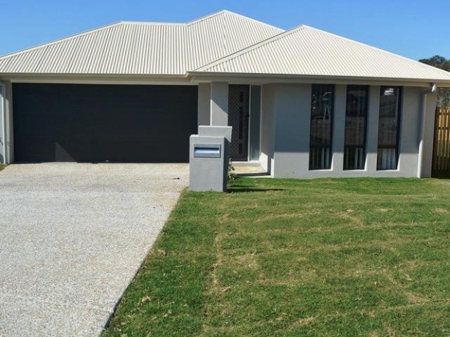 MODERN 4 BEDROOM FAMILY HOME WITH OPEN PLAN KITCHEN LIVING DINING THAT OPENS OUT ONTO AN ALFRESCO DINING AREA. VERY GOOD SIZE YARD