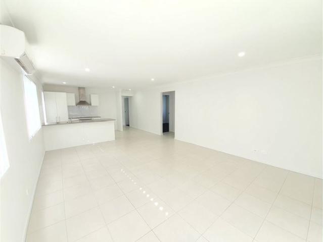 MODERN 4 BEDROOM FAMILY HOME WITH OPEN PLAN LIVING. VERY GOOD SIZE BEDROOMS. DOUBLE GARAGE. CLOSE TO SCHOOLS, TRANSPORT, SHOPS AND RESTAURANTS