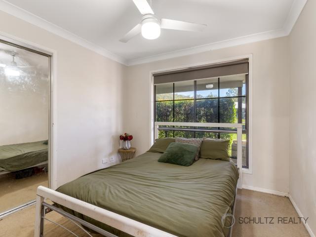 Modern 4 Bedroom Family Home with Large Shed and Pool set on over one acre!