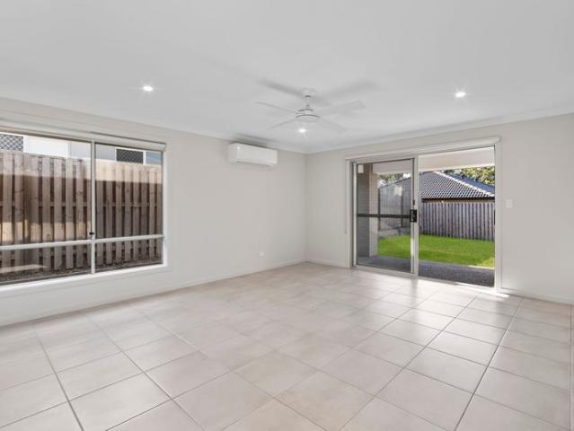Modern 4 Bedroom Family Home with Spacious Living & Alfresco Logan Reserve