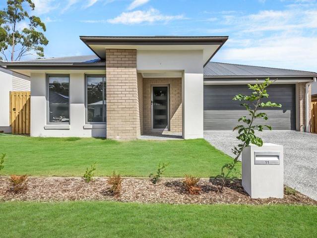 MODERN 4 BEDROOM FAMILY LIVING IN THE HEART OF JIMBOOMBA