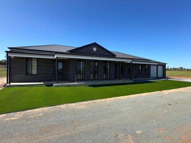 MODERN 4 BEDROOM HOME ON ACREAGE