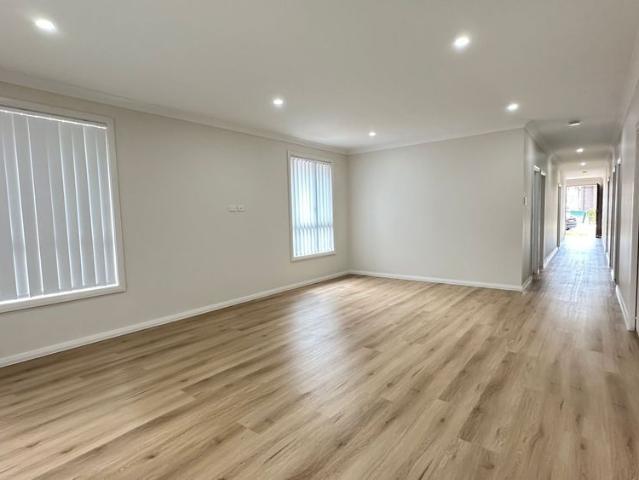 Modern 4 Bedroom Home Offering Space, Style & Comfort !